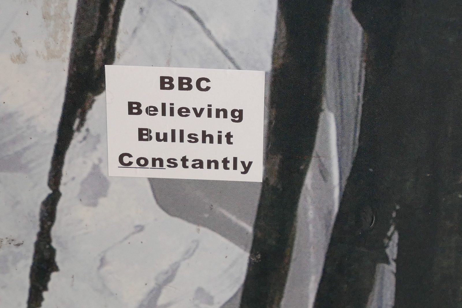 A sticker attacking the BBC, left stuck to street furniture on York Road after the rally.